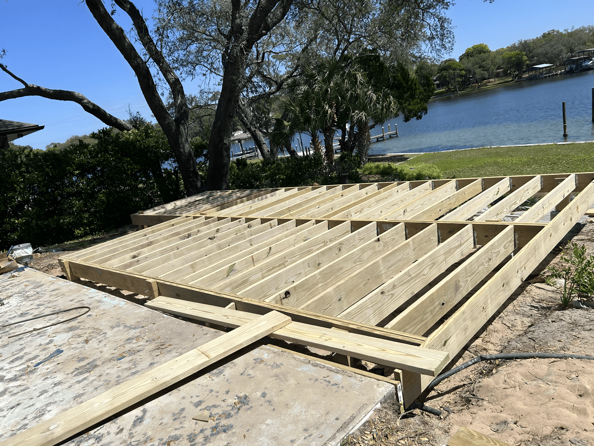 Completed backyard deck project by On Q Renovations on the Emerald Coast