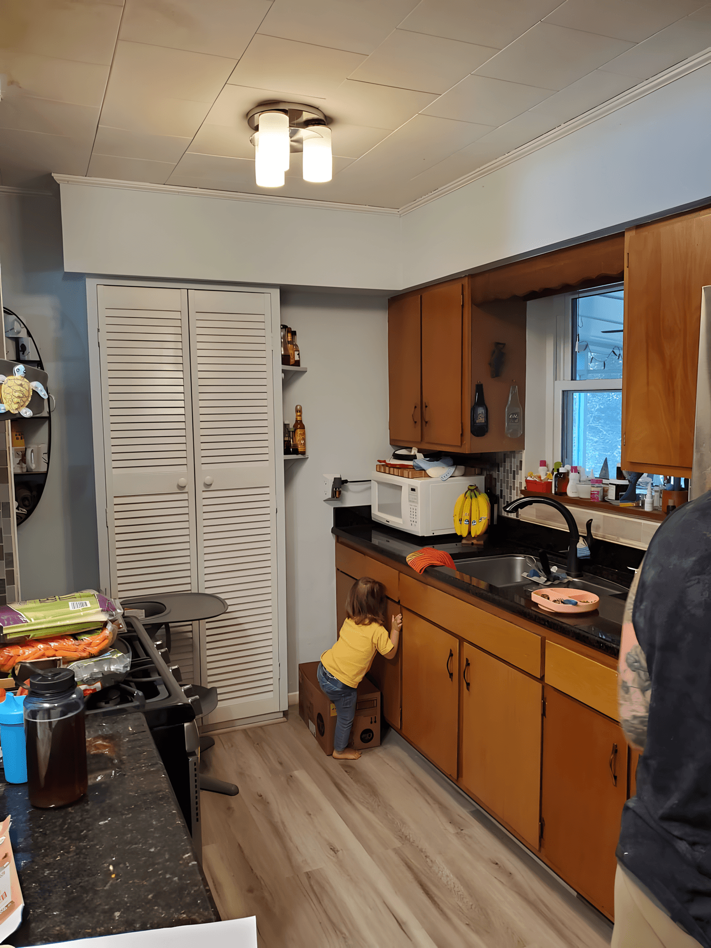 Outdated kitchen before renovation by On Q Renovations in Fort Walton Beach